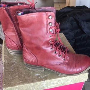 Red lace up combat style boots